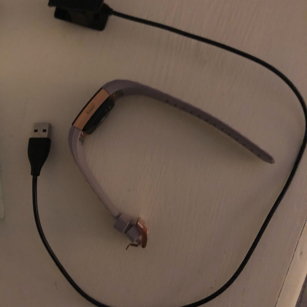 Rose gold Fitbit
